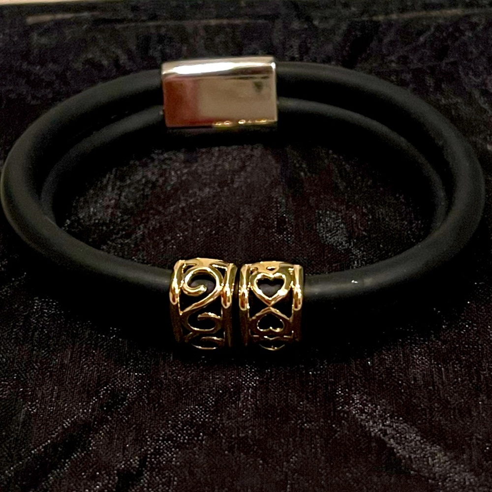 Black double NEW leather bracelet with 2 gold plated heart charms silver clasp.